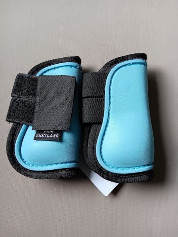 Beenbeshermers licht blauw mini