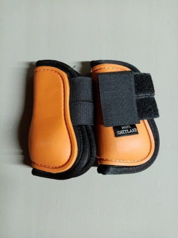 Peeskapje oranje mini