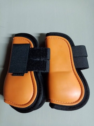 Peeskapje oranje shetlander